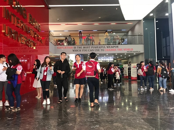 Universities provide scholarships to ease burden on disadvantaged students - 1