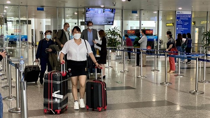 Vietnam fully reopens borders to tourists after pandemic hiatus - 1