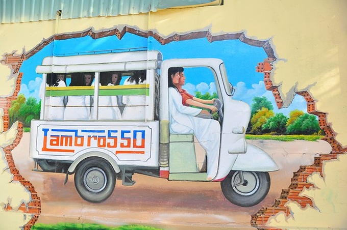 Mural project brightens Can Tho street - 6 Mural project brightens Can Tho street - 6