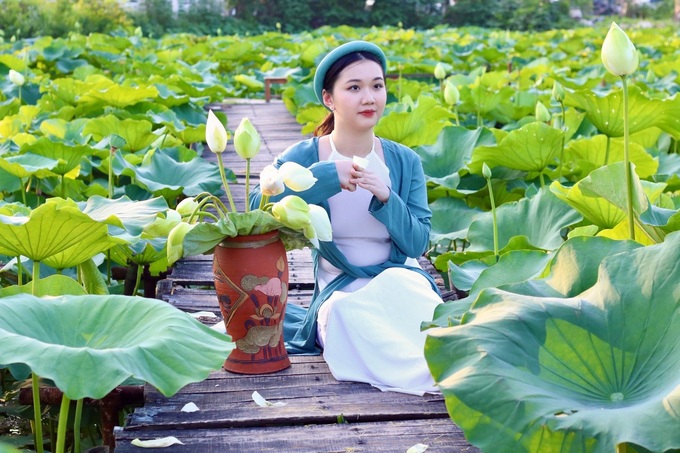 Hanoi lotus ponds enchant visitors - 1