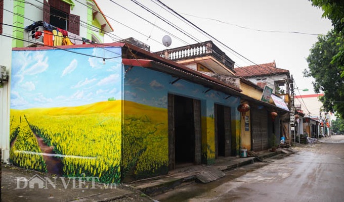 Mural project brightens Hanoi suburban village - 3