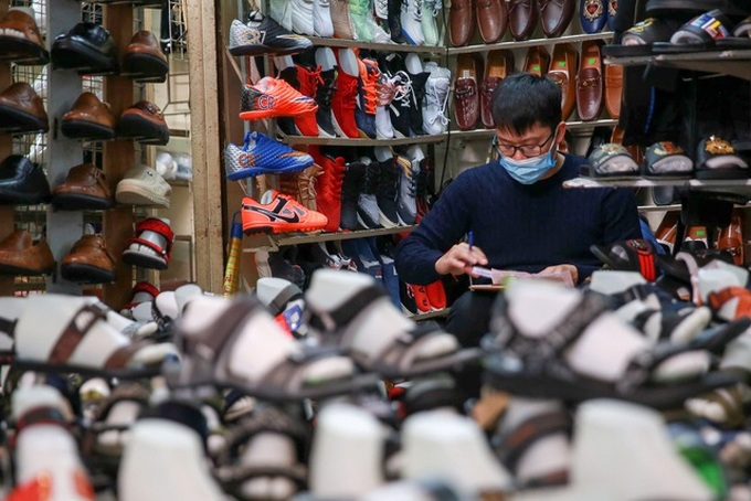 Hanoi’s biggest market quiet amid coronavirus fears - 7