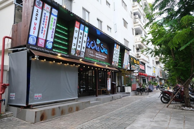 South Korean and Japanese streets still quiet in HCM City - 2