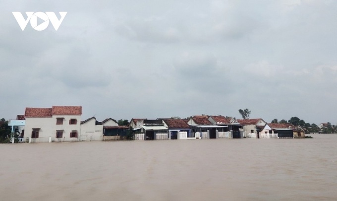 Flood death toll rises to 9 in central Vietnam - 1
