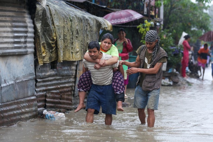 Nepal flood waters smash through village - 1