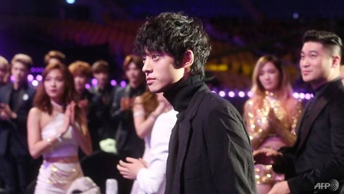 Second S. Korean star quits as K-pop sex scandal spreads - 1