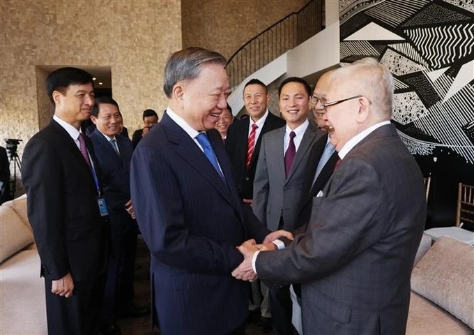 Top leader meets Vietnamese intellectuals in US - 1