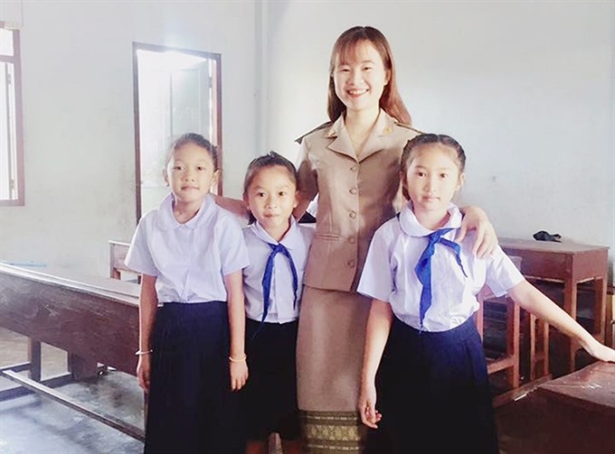 Vietnamese teacher spreads the word in Laos - 1