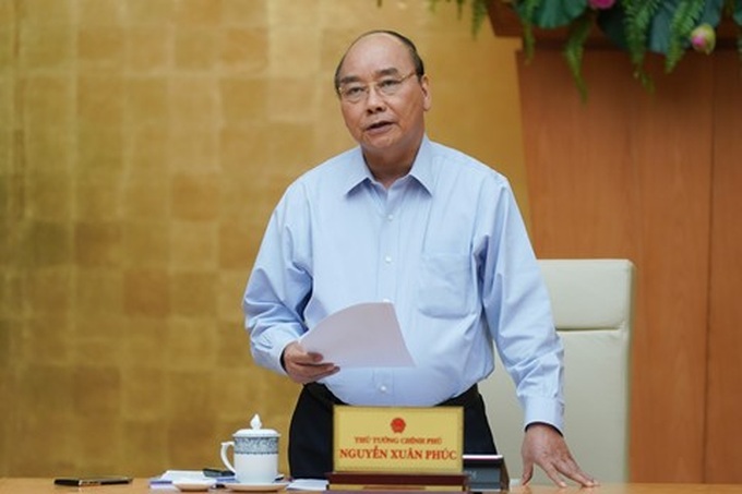 Vietnam basically pushes back COVID-19 epidemic, PM Phuc says - 1