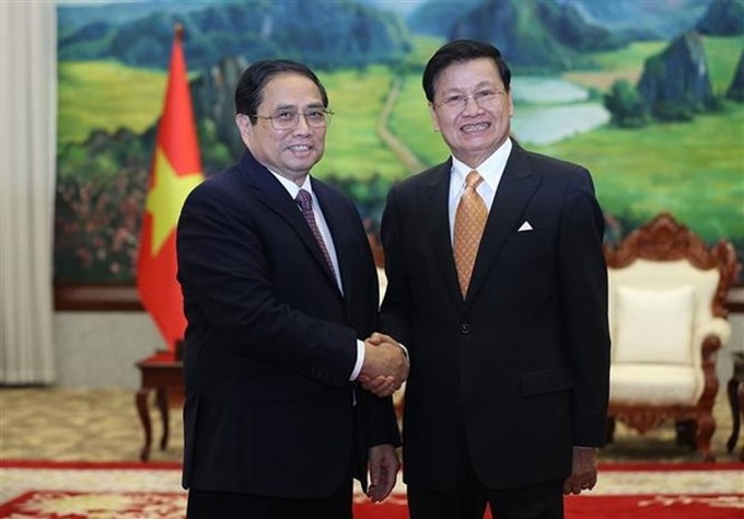 PM Chinh meets Party General Secretary, President, and NA Chairman of Laos - 1 PM Chinh meets Party General Secretary, President, and NA Chairman of Laos - 1