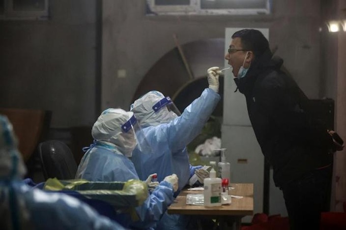 China records nearly 3,400 daily virus cases in worst outbreak in two years - 1