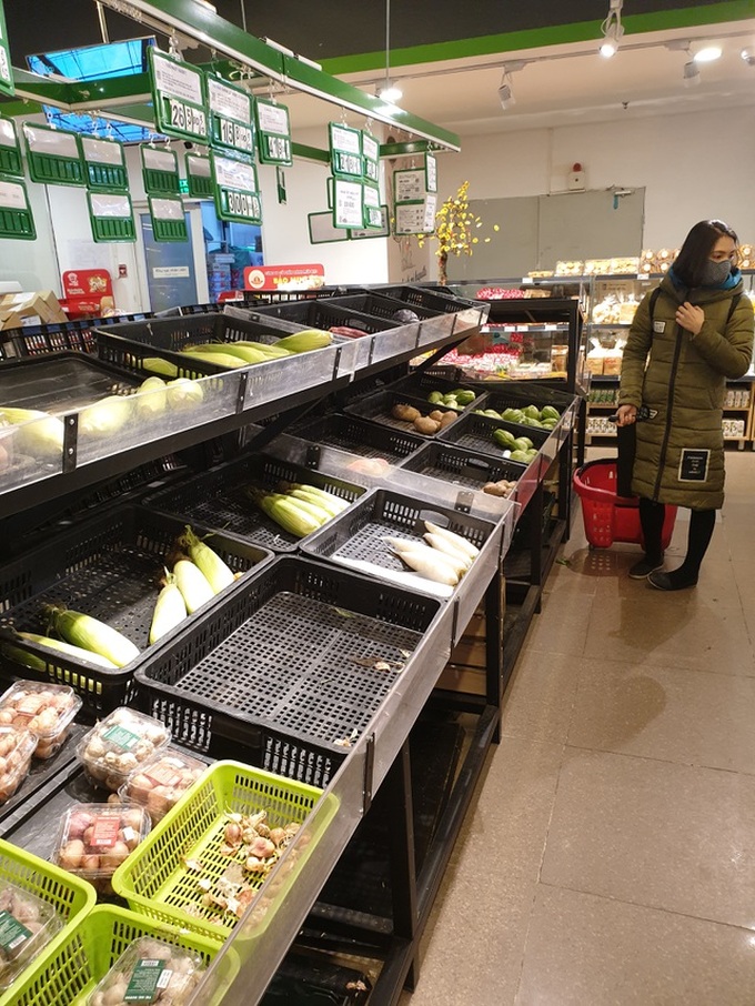 Supermarket shelves empty as people avoid going out - 2