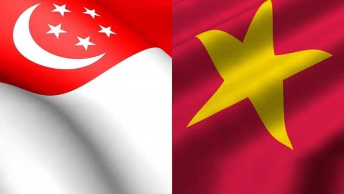 Singapore President's Vietnam visit to bolster all-around cooperation - 1