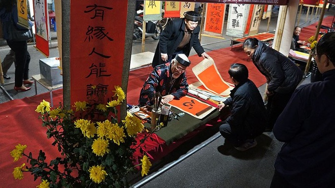 Hanoi flower market opened for Tet - 7
