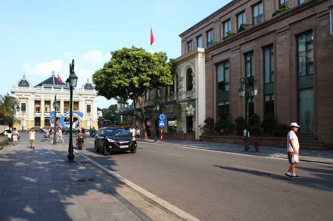 Hanoi's Trang Tien Street before and now - 16