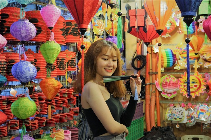 Colourful HCM City street attracts young people - 2