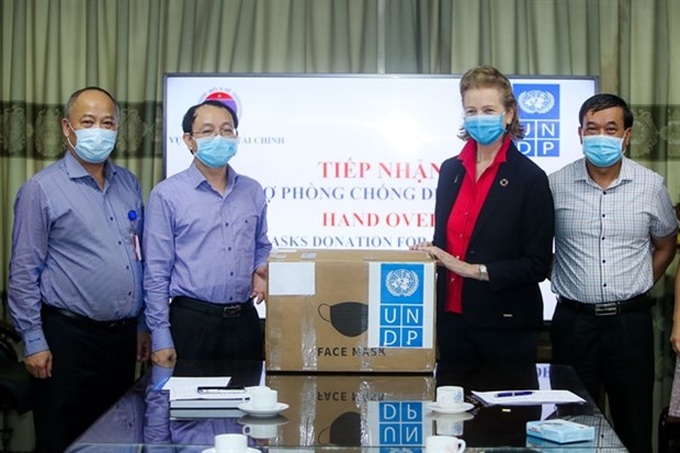 UNDP supports Vietnam in COVID-19 fight - 1