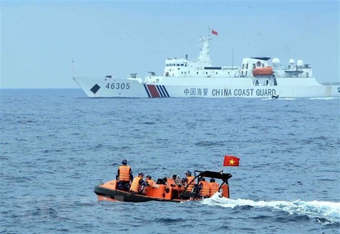 Vietnam, China hold negotiations on sea-related issues - 1