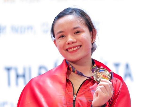 Vietnamese female weightlifter sets three new SEA Games records - 1