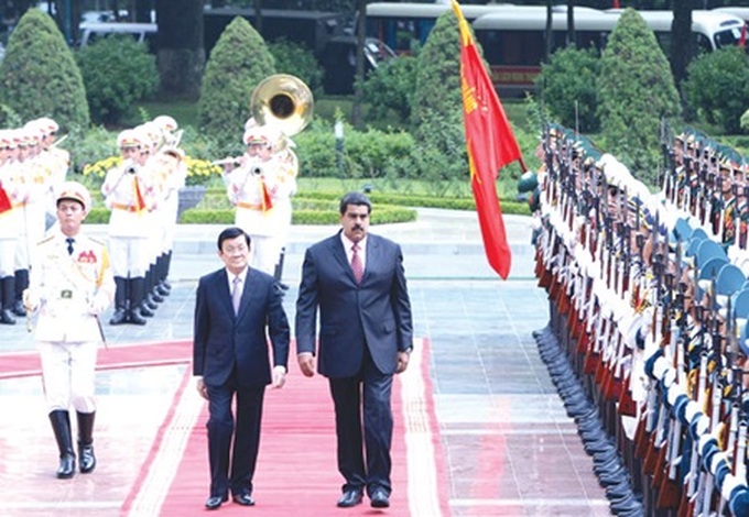 Vietnamese, Venezuelan leaders decide to deepen trade relations - 1