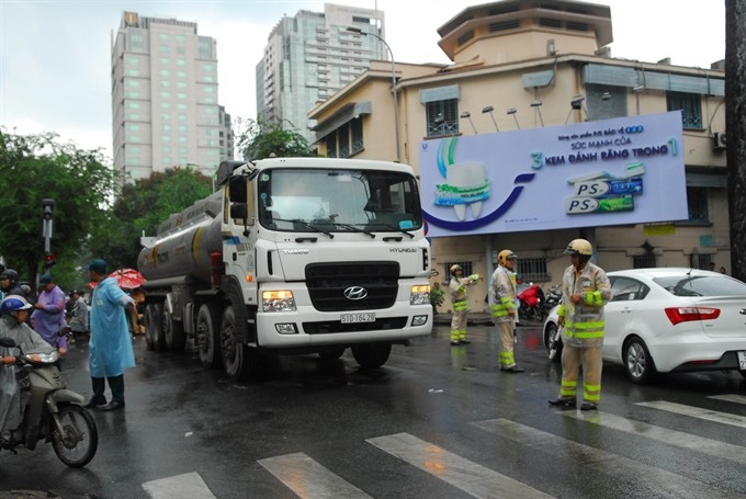 Illegal trucks cause increasing number of accidents in HCM City - 1