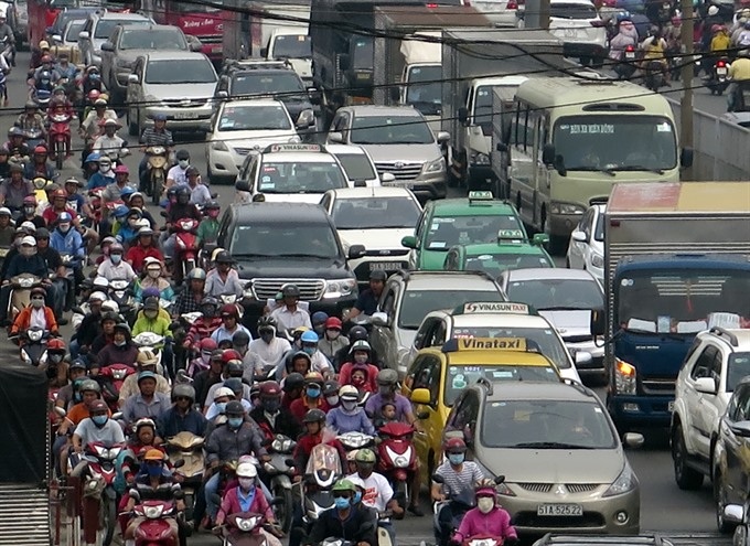 City mulls car tolls to ease traffic - 1