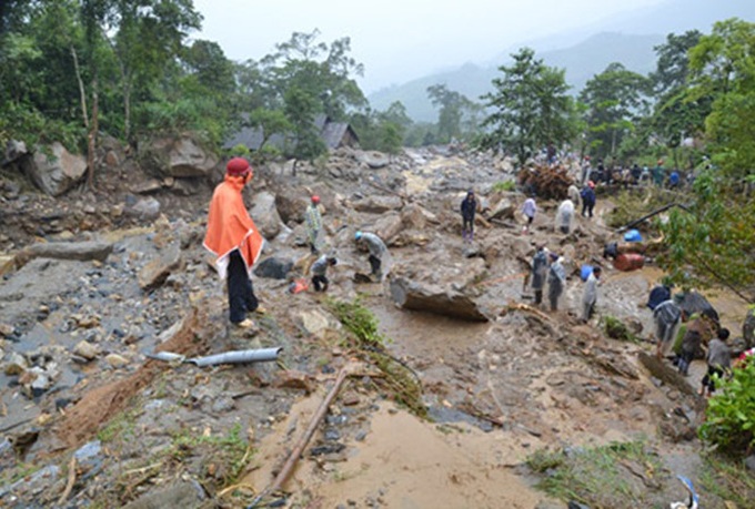 Seven Vietnamese killed in flash flood and landslide in China - 1