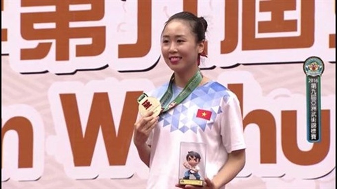Tran Thi Khanh Ly wins Asian wushu gold medal - 1 Tran Thi Khanh Ly wins Asian wushu gold medal - 1