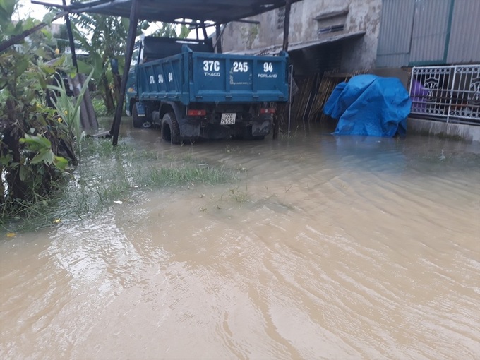 Seven die in Nghe An floods, many areas isolated - 2