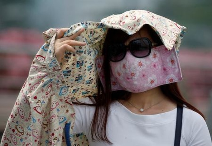 Smoke from Indonesian fires hits 'unhealthy' level in Singapore - 1 Smoke from Indonesian fires hits 'unhealthy' level in Singapore - 1