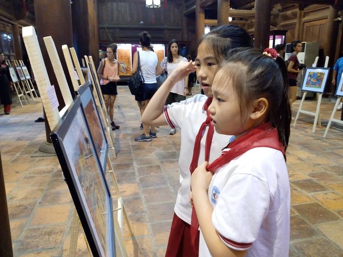 Folk painting exhibition opens at Temple of Literature - 1