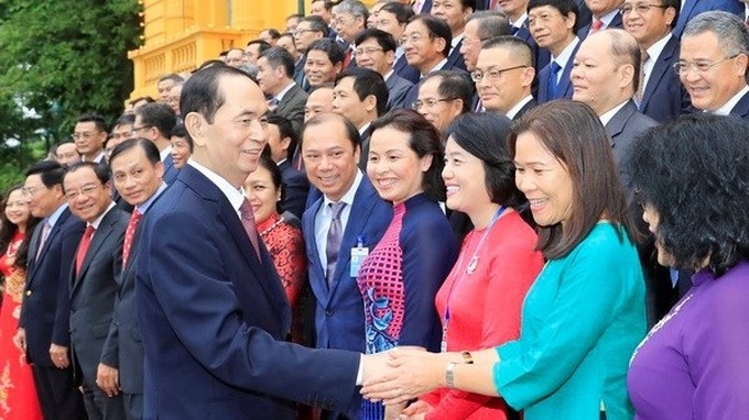 President meets Vietnamese chief representatives overseas - 1