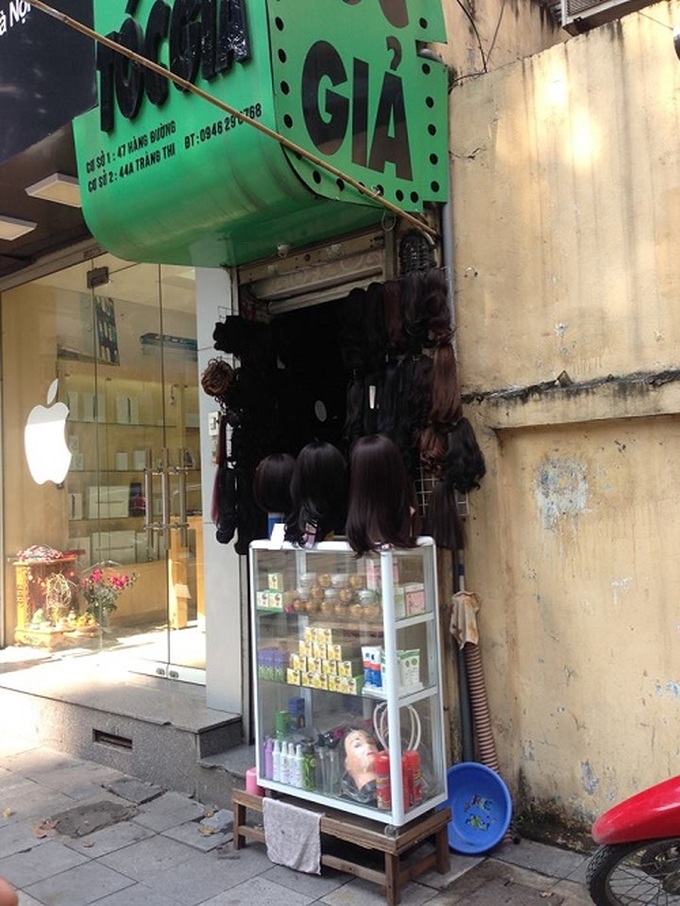 Tiny shops cling to Hanoi of old - and prosper - 5