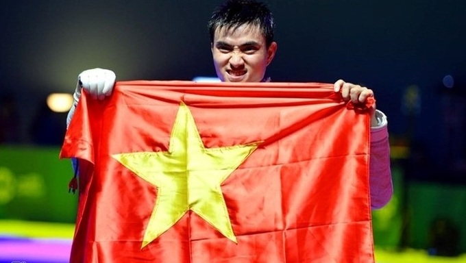 Fencer Vu Thanh An named Vietnam’s flag bearer at 29th SEA Games - 1 Fencer Vu Thanh An named Vietnam’s flag bearer at 29th SEA Games - 1