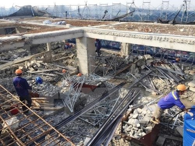 Hanoi tackes illegal building at 8B Lê Trực Street - 1