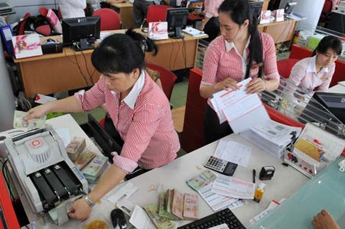 Big Vietnamese banks seek new manganement for new year - 1