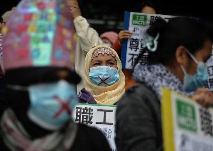 Hong Kong domestic workers treated as 'slaves': Amnesty - 1