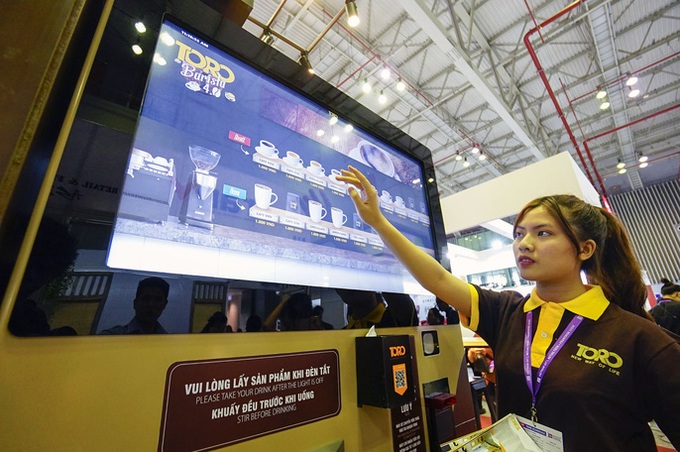 Automatic coffee machine displayed at HCM City expo - 4