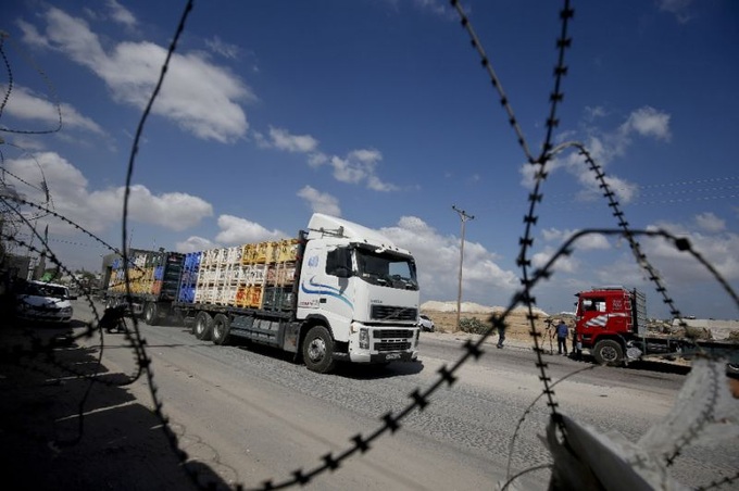 Israel reopens Gaza crossing as truce talks progress - 1