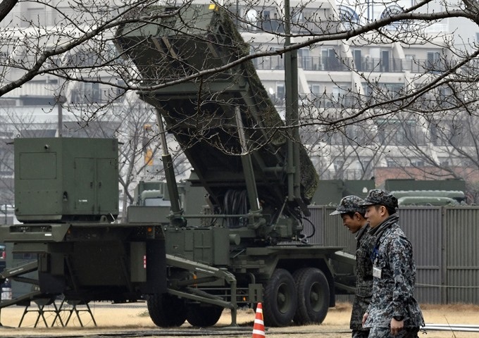 Japan says three N. Korean missiles landed in its waters - 1