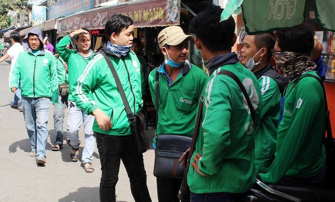 HCM City GrabBike drivers go on strike - 1