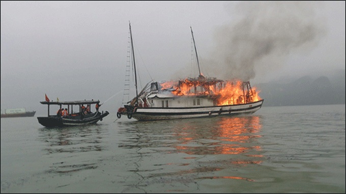 Ha Long Bay cruise ship bursts into flame - 1