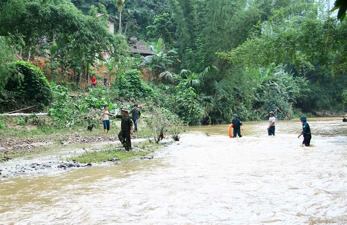 Weekend flooding kills seven in northern Vietnam - 1