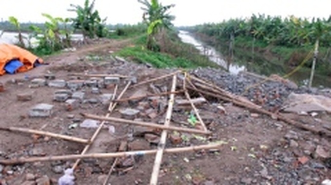 Warnings, dismissals for officials in Tien Lang land case - 1