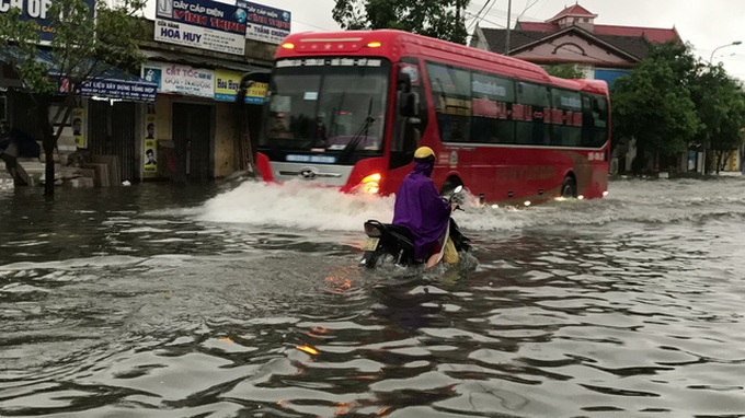 Seven die in Nghe An floods, many areas isolated - 7