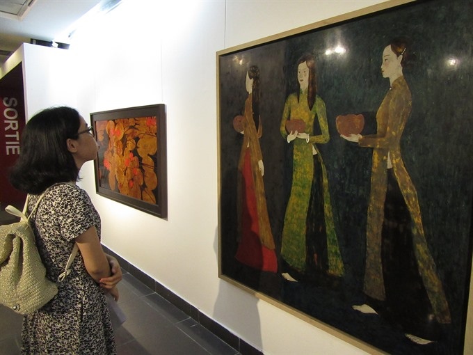 Lacquer paintings honour Vietnamese beauty - 1