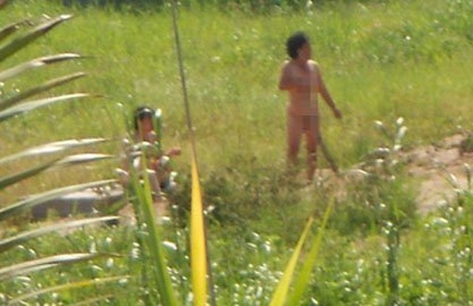 naked family fail Mother and daughter strip naked, fail to save family land