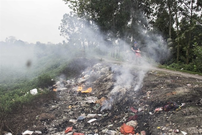 Pollution, lifestyles raise death rate in Vietnam - 1
