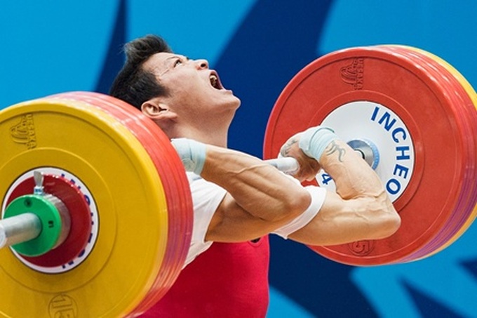 Vietnamese weightlifter wins gold, silver medals at world championships - 1