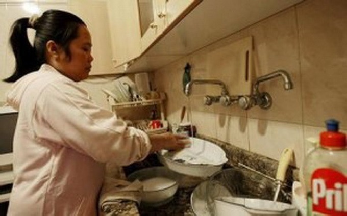 Indonesia to ban exporting maids overseas - 1